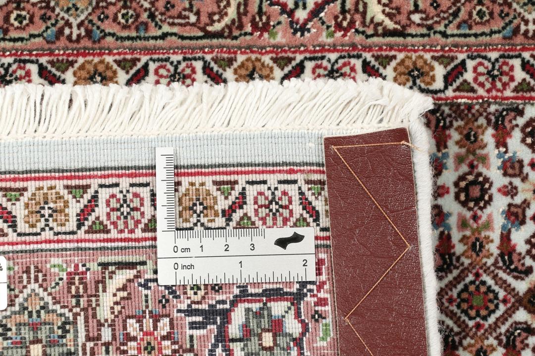 Håndknyttet Tabriz-tæppe fra Mellemøsten i dybe røde og beige nuancer