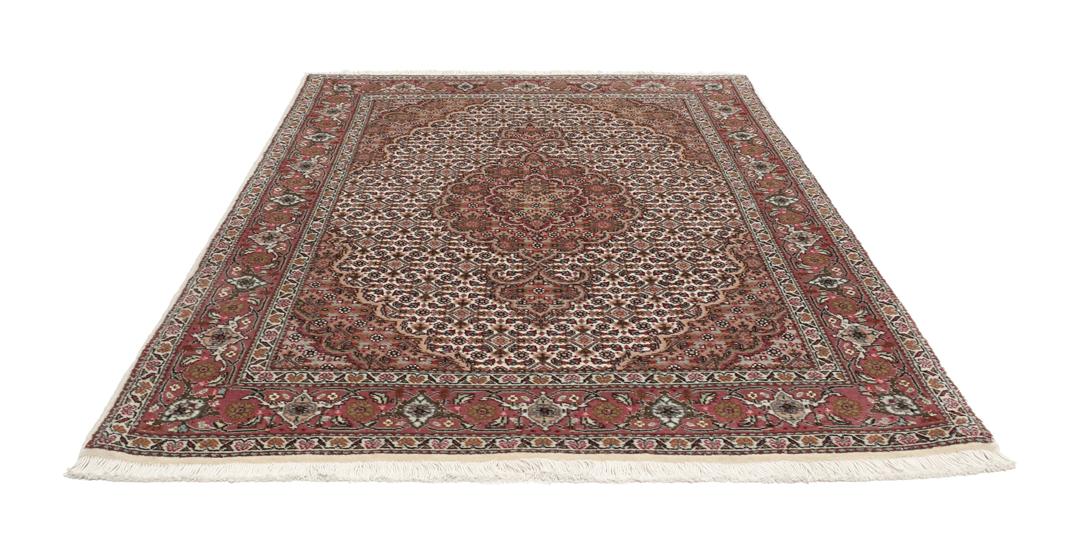 Håndknyttet Tabriz 50 Raj-tæppe med indviklede blomstermotiver i mørkerød og beige