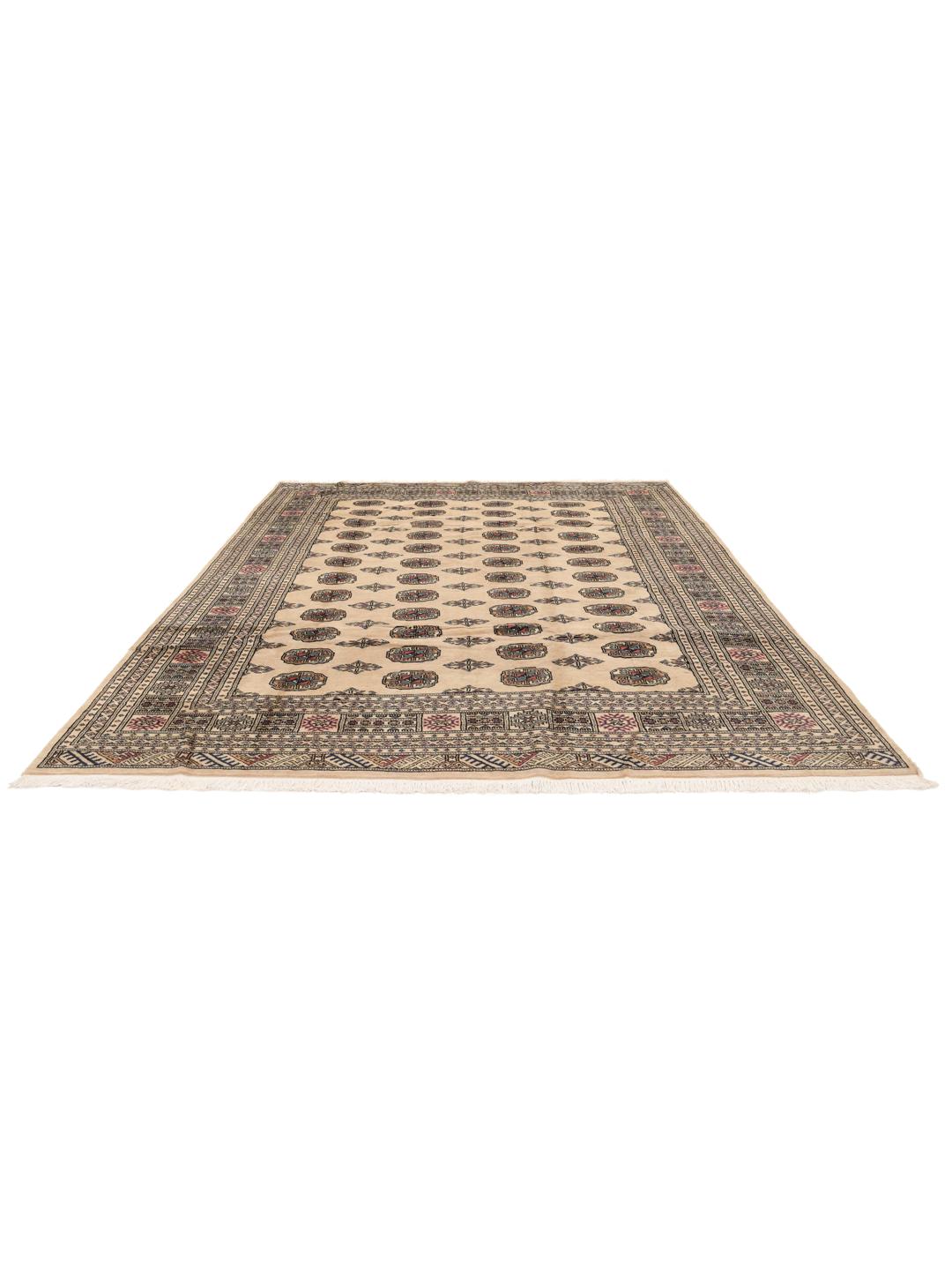 A hand-knotted Pakistan Bokhara 2ply rug with a beige field and traditional repeating motifs.
