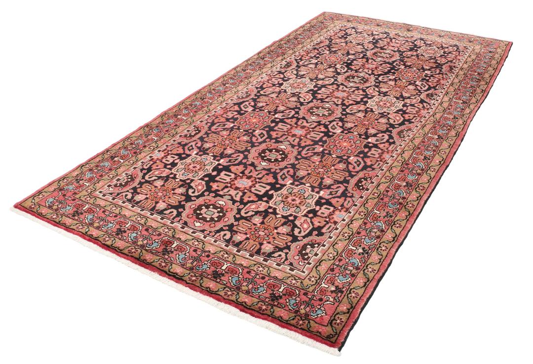 A rectangular hand-knotted Hamadan rug from the Middle East with a dark-red and black colour palette.