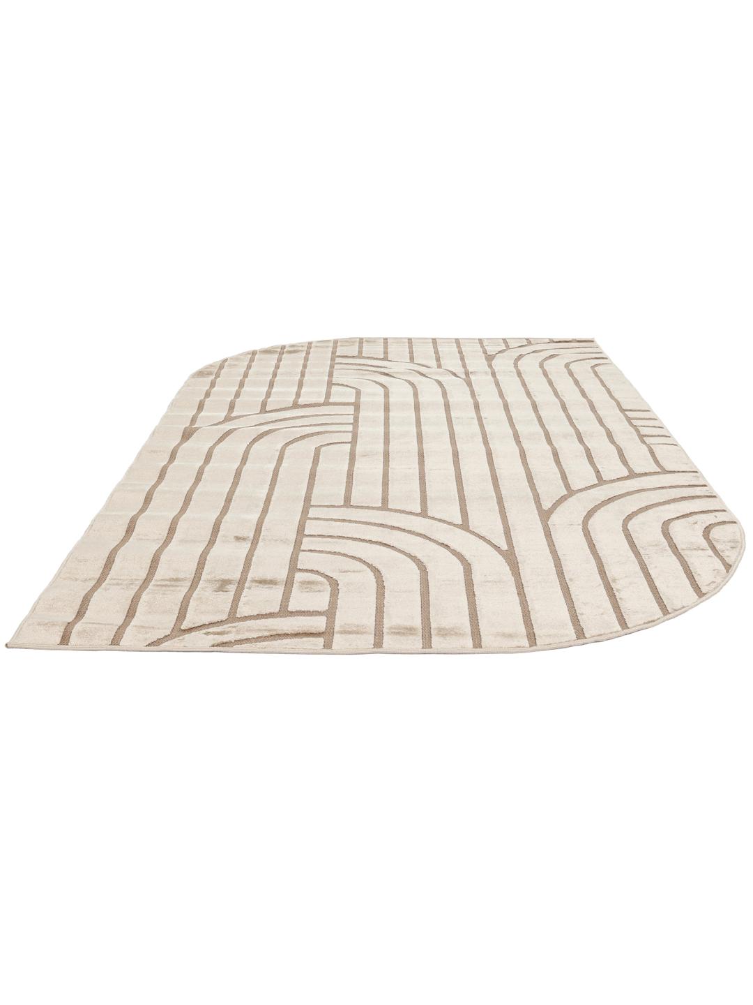 Onregelmatig beige vloerkleed met een modern hoog-laag geometrisch patroon