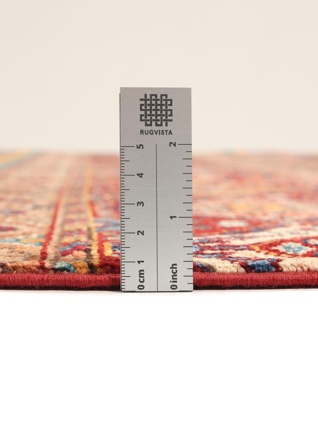 Covor afgan înnodat manual în nuanțe de roșu și albastru cu un design geometric în dungi