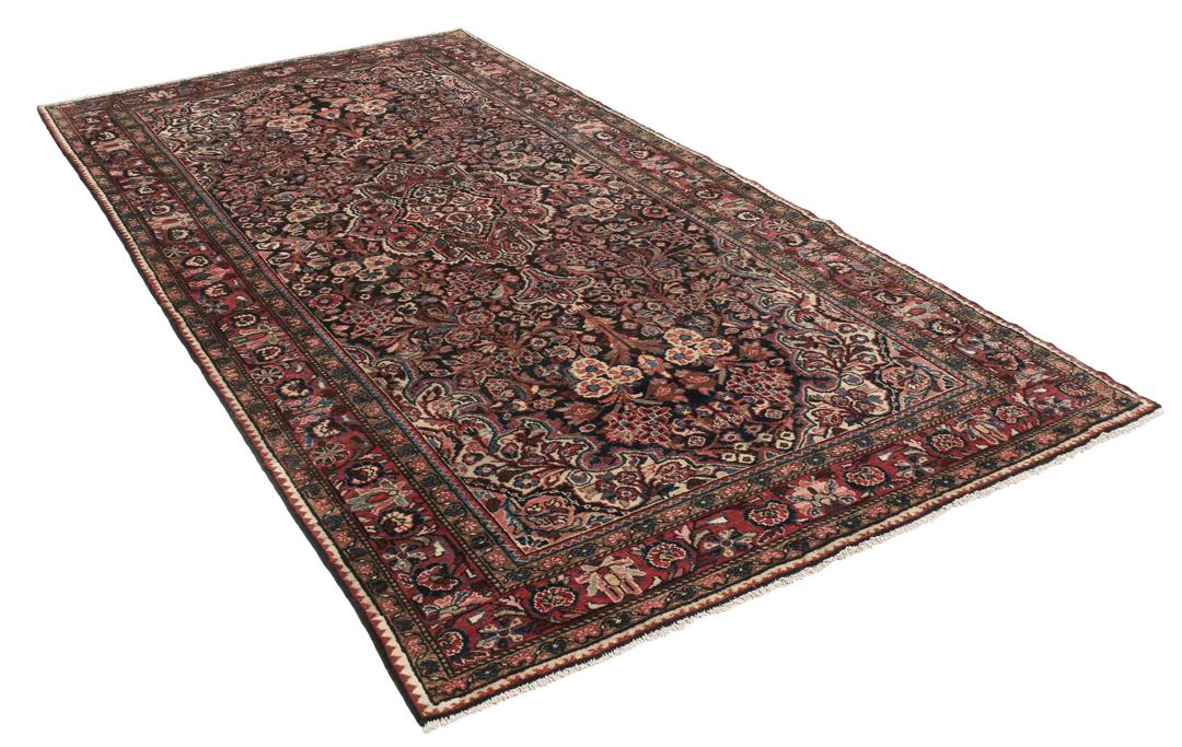 Handgeknoopt Hamadan-tapijt uit het Midden-Oosten met een donkerrood en bloemrijk ontwerp