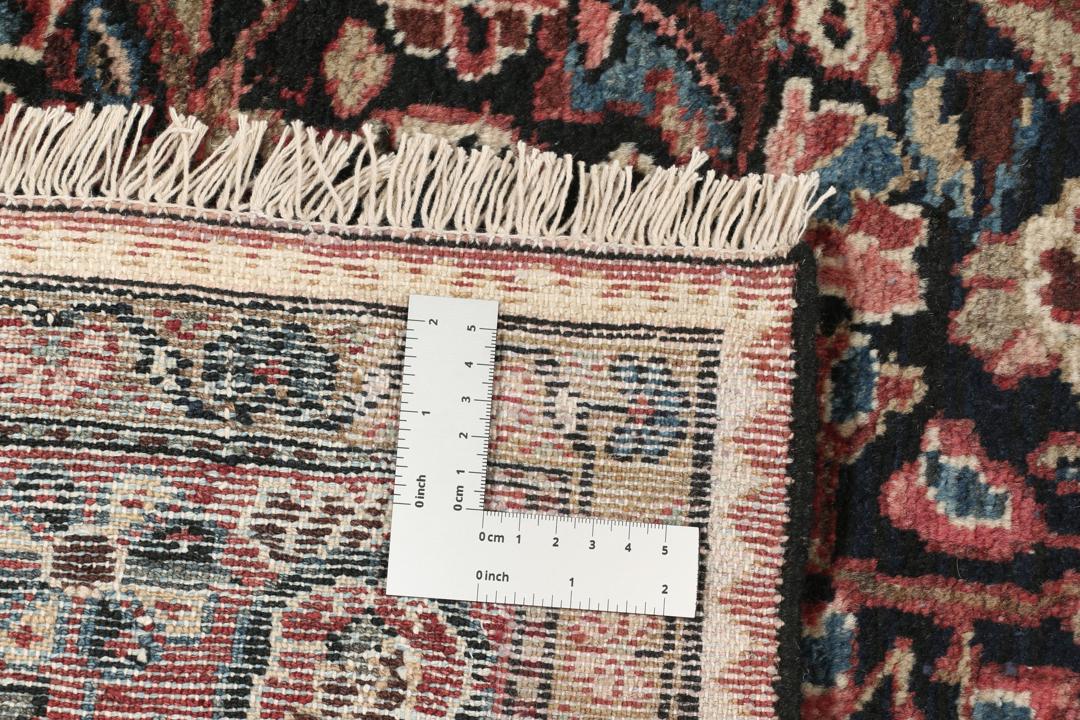 Handgeknoopt Hamadan-tapijt uit het Midden-Oosten met een donkerrood en bloemrijk ontwerp
