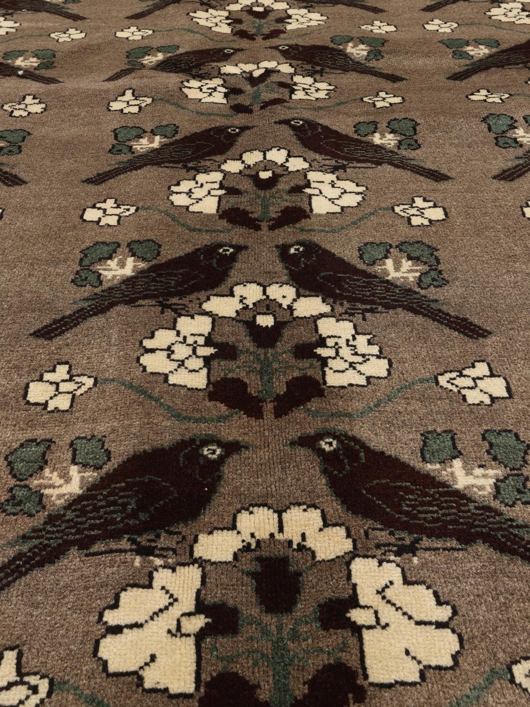 Hand-knotted Qashqai rug with bird and floral patterns in brown tones