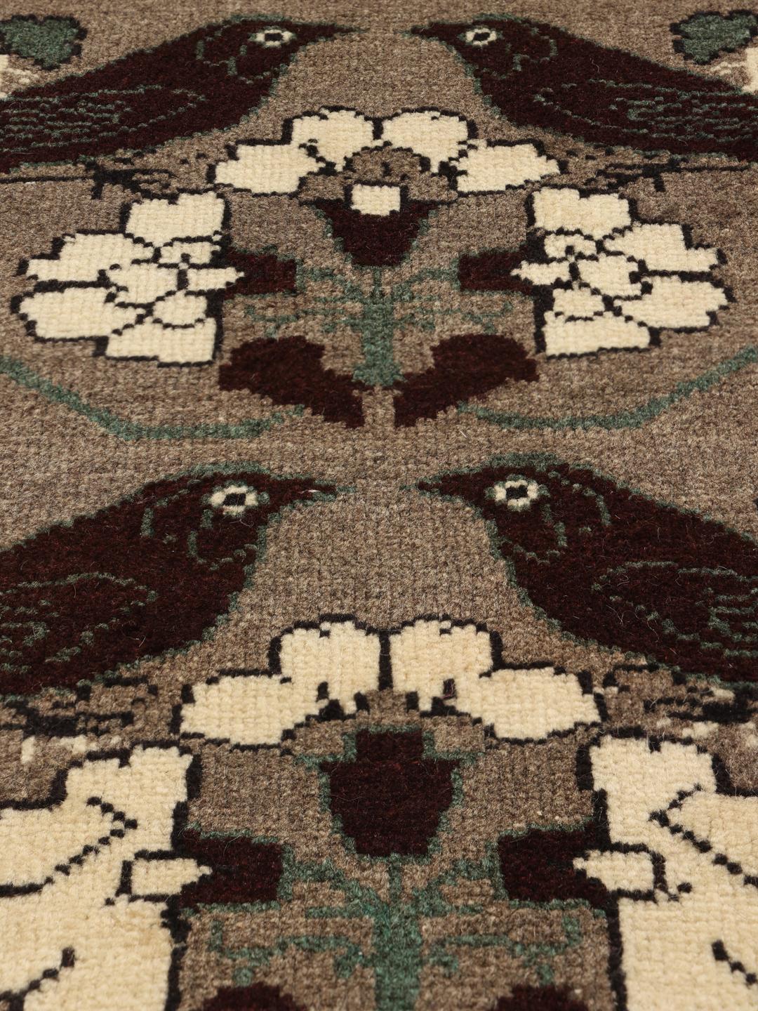 Hand-knotted Qashqai rug with bird and floral patterns in brown tones