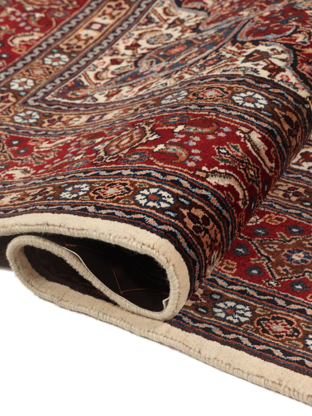 A one-of-a-kind hand-knotted Moud rug in dark-red and beige with an ornate floral medallion pattern.