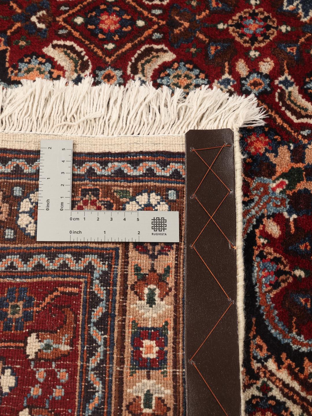 A one-of-a-kind hand-knotted Moud rug in dark-red and beige with an ornate floral medallion pattern.