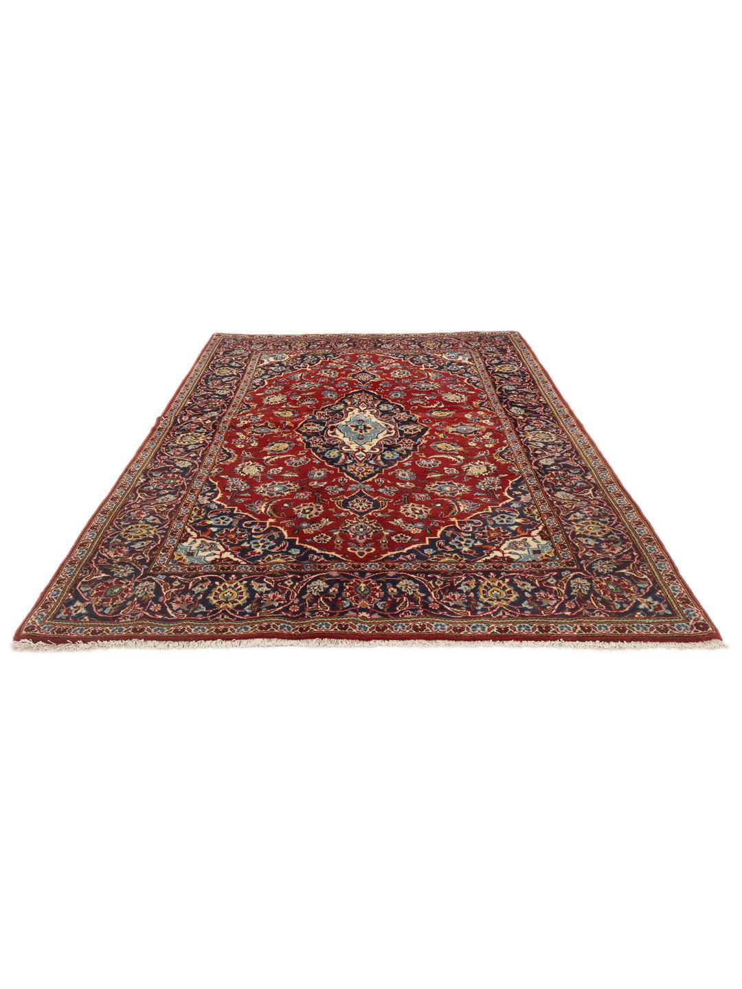 Hand-knotted Keshan rug from the Middle East in shades of red and blue.