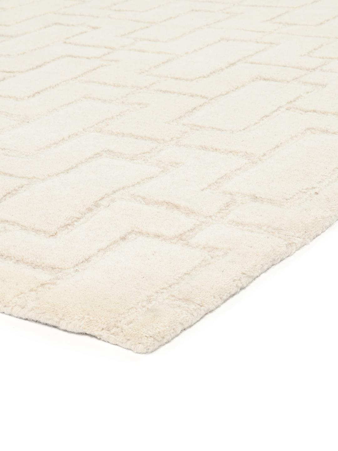 Beige wollen vloerkleed met geometrisch patroon