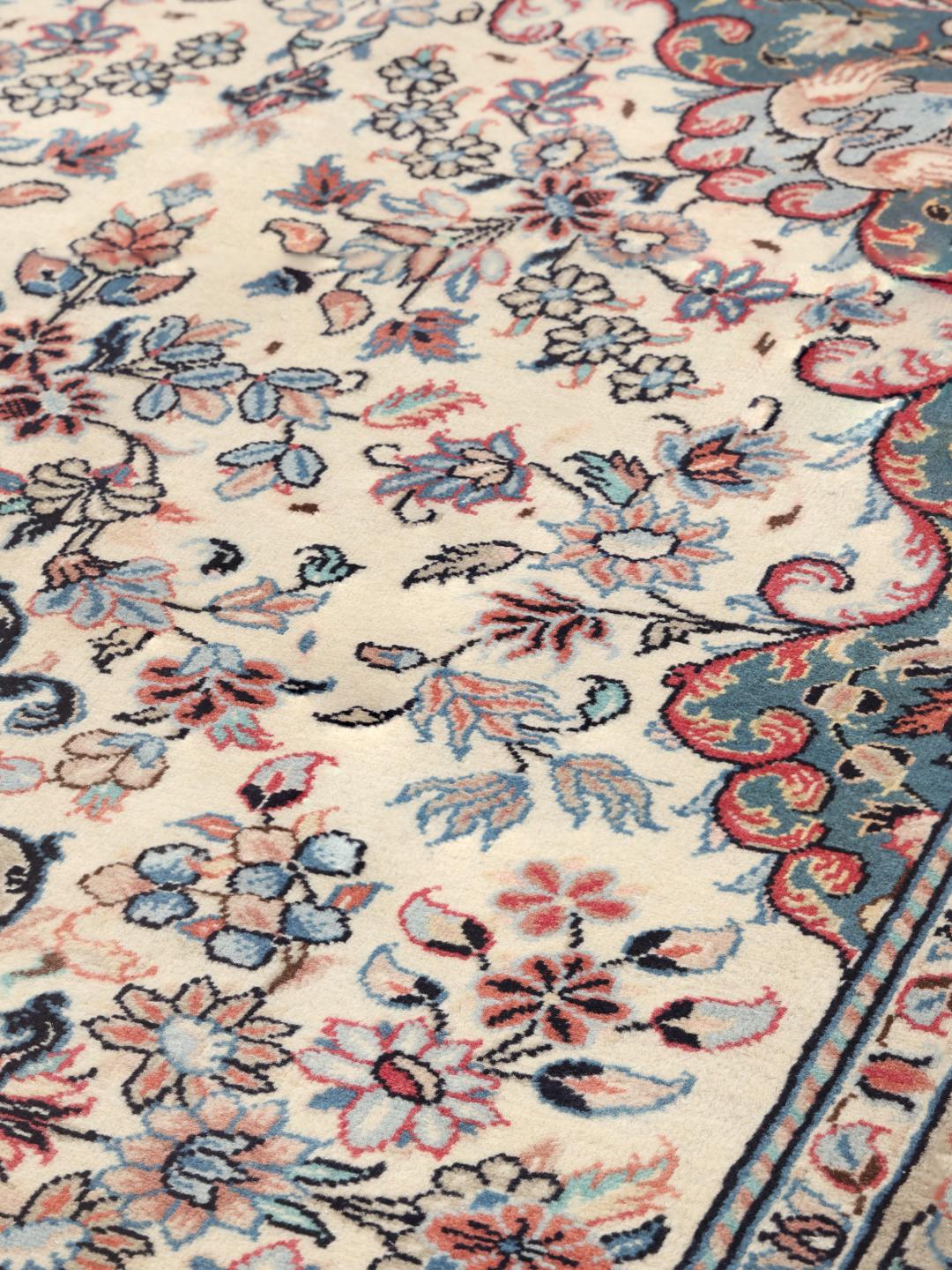 Hand-knotted Keshan rug from the Middle East in multicolor floral pattern