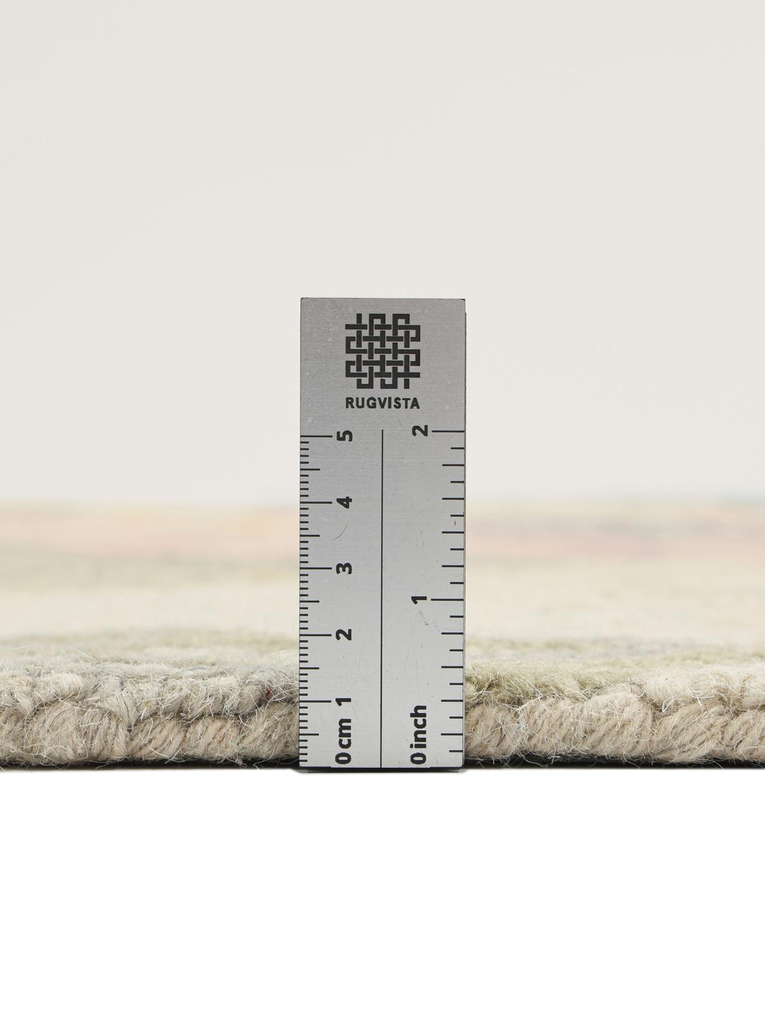 Beige rond vloerkleed met bloemenpatroon
