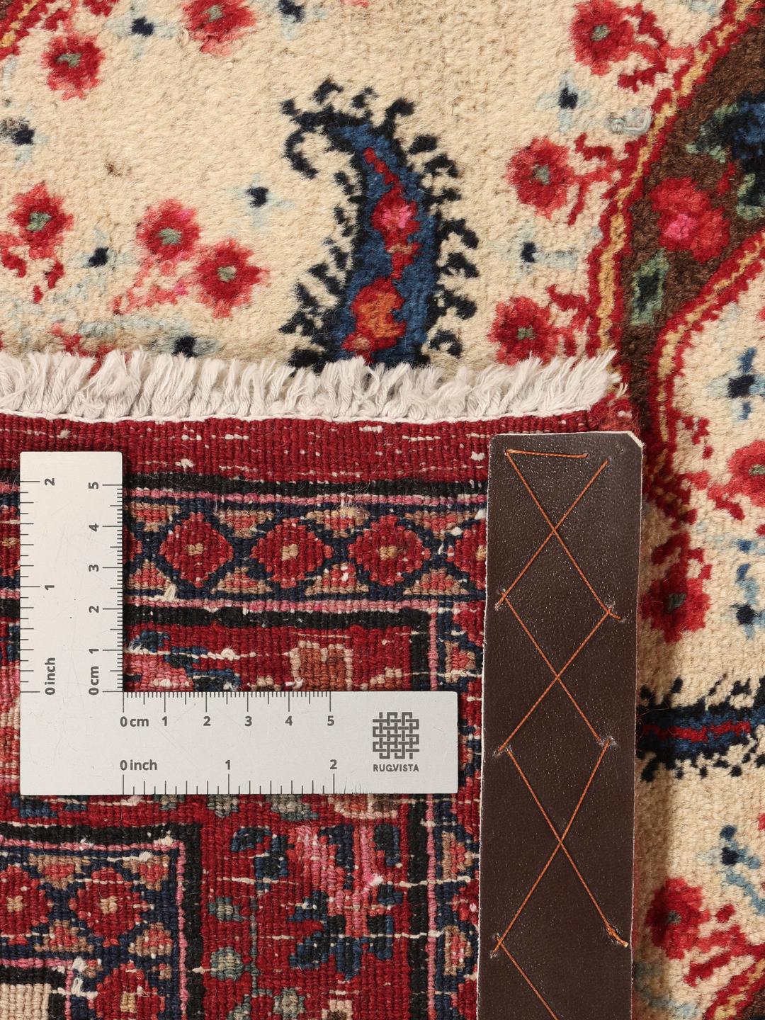 Hand-knotted Moud rug from the Middle East featuring a red and beige floral pattern