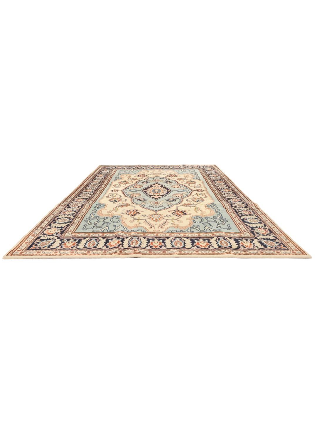 Handgeknoopt wollen tapijt uit het Midden-Oosten met een blauw en crèmekleurig medaillondesign