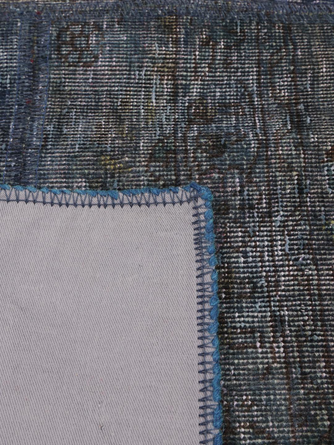 Vierkant handgemaakt patchwork vloerkleed in blauwtinten met ingewikkelde patronen