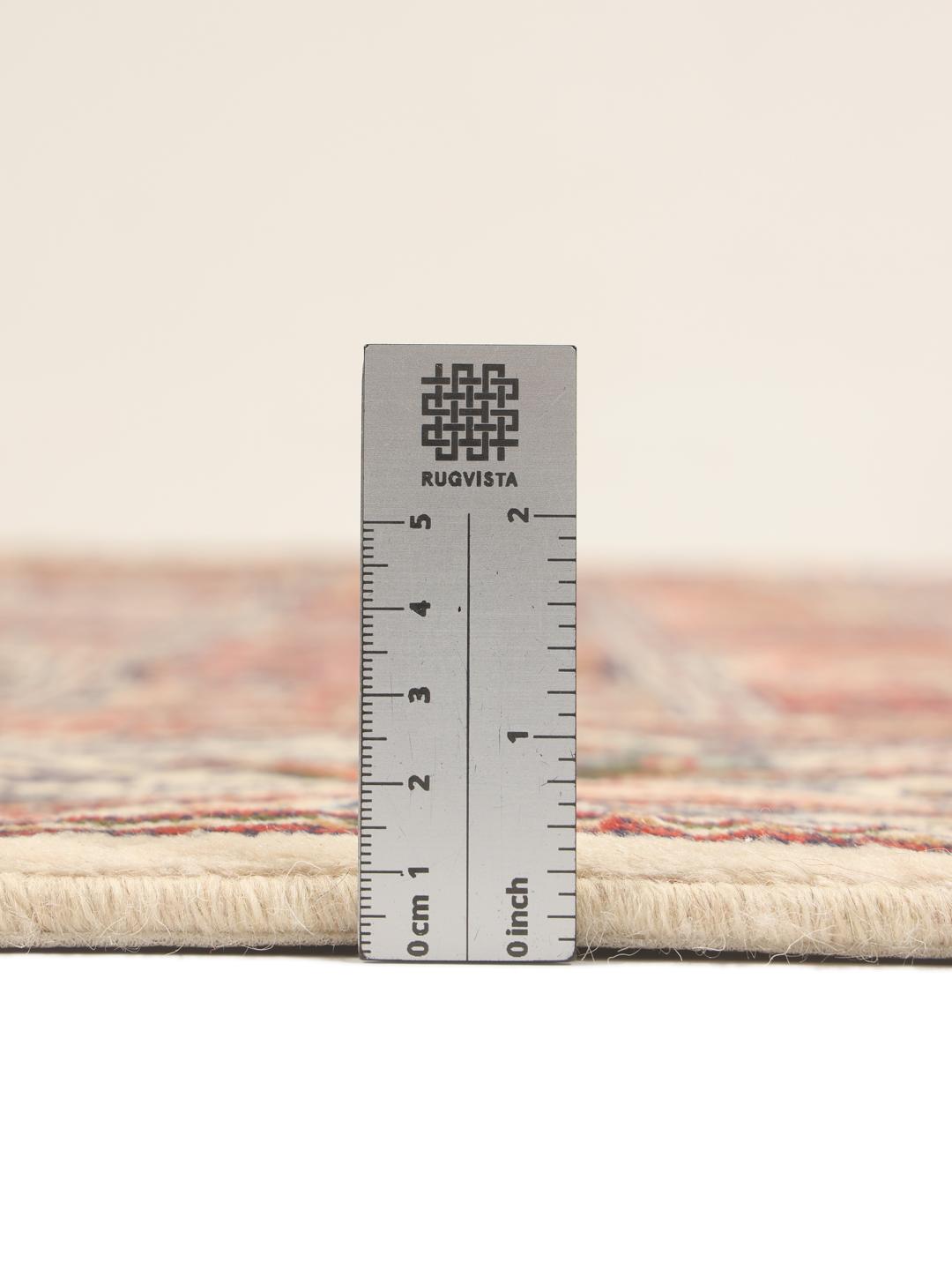 Hand knotted Moud rug from the Middle East featuring a multicolor grid pattern with floral motifs