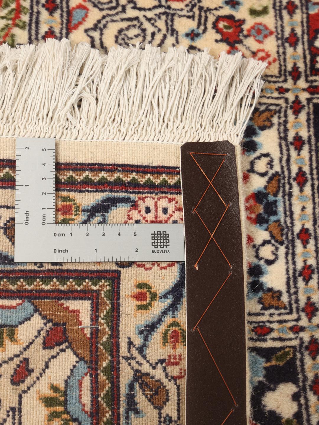 Hand knotted Moud rug from the Middle East featuring a multicolor grid pattern with floral motifs