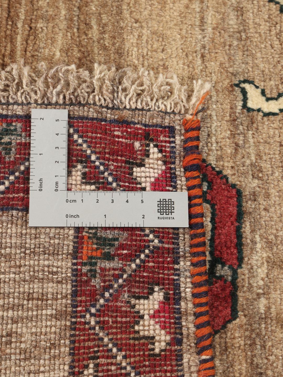 Håndknyttet beige tæppe med dyremotiver fra Mellemøsten