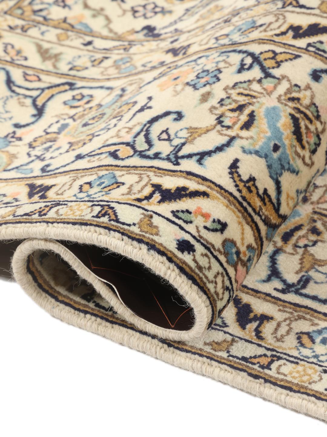 Hand-knotted Keshan rug from the Middle East in beige with floral patterns