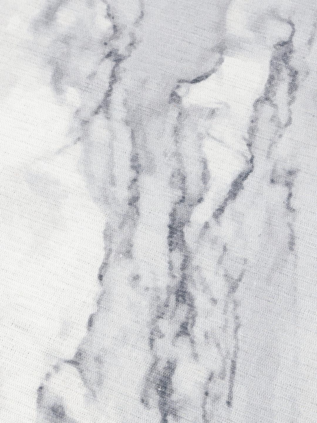 Alfombra redonda gris con patrón de piedra