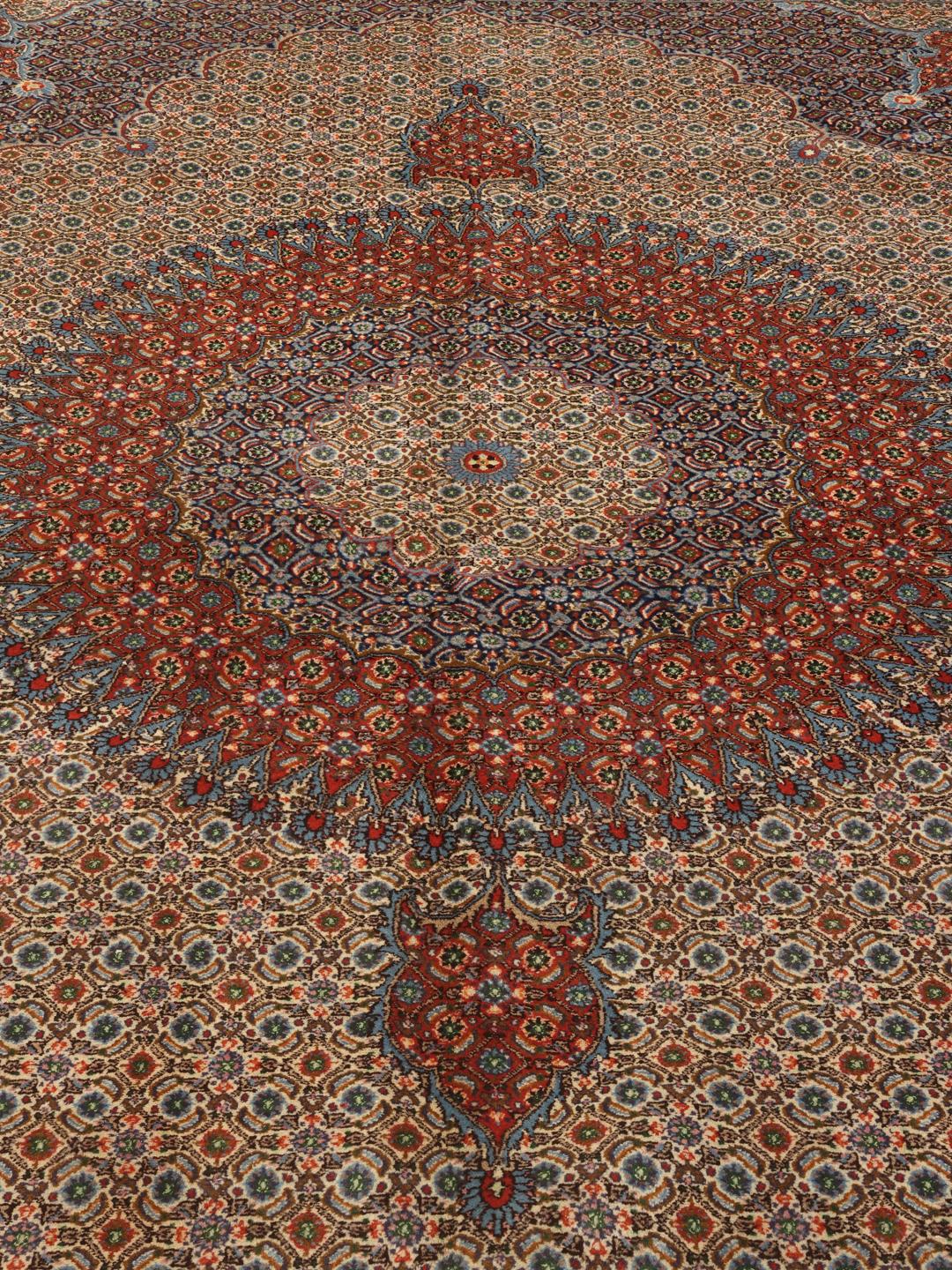 Handmade Moud rug with a central medallion in dark-red and beige tones