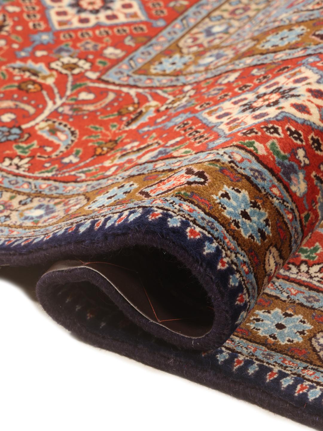 Handmade Moud rug with a central medallion in dark-red and beige tones