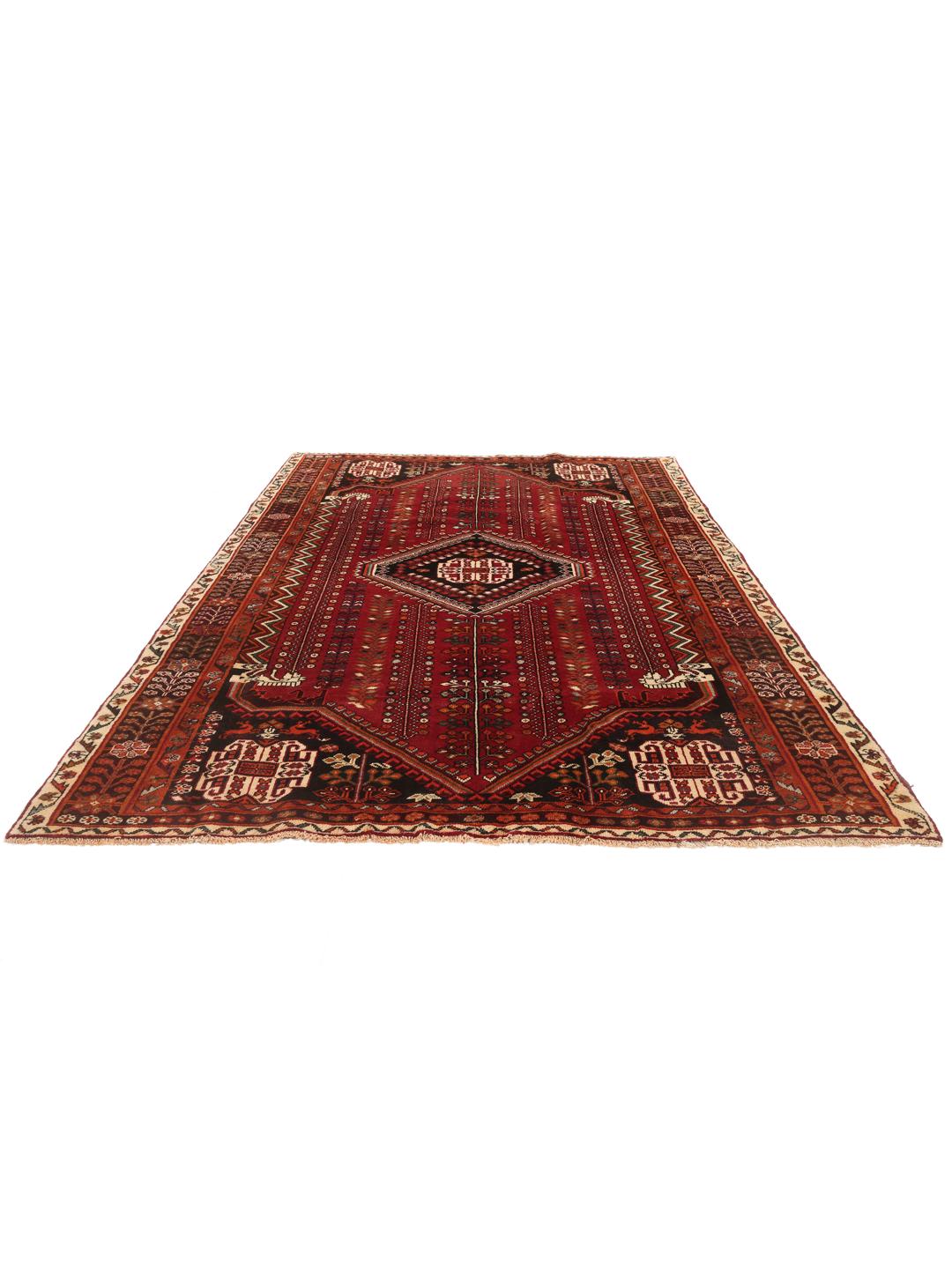 Hand-knotted Qashqai rug with traditional tribal patterns in red and dark tones