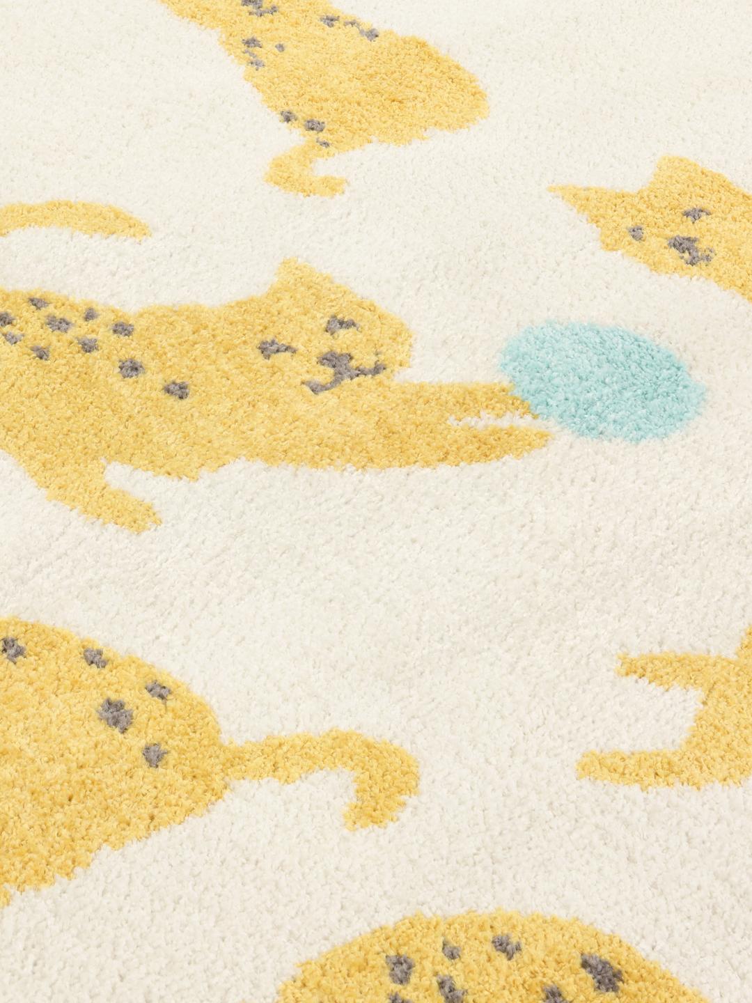 Wit en multicolour tapijt met een speels kattenmotief