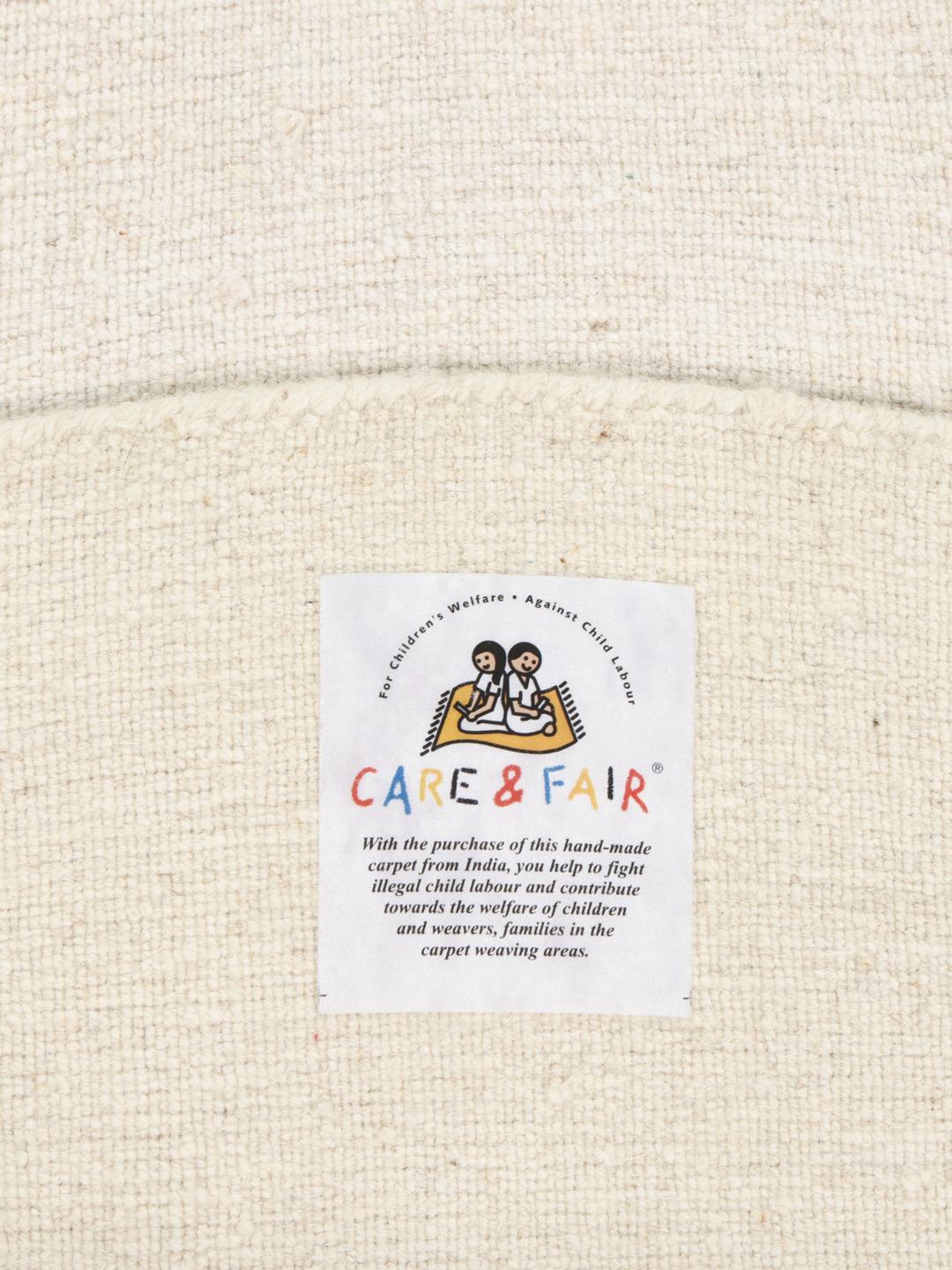 Tapis rond en laine blanc cassé avec finition tissée main