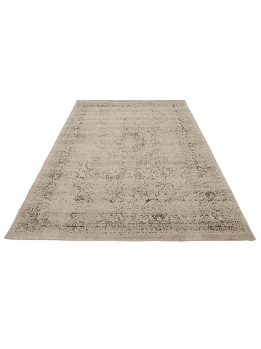 Beige vloerkleed met laagpolig oppervlak