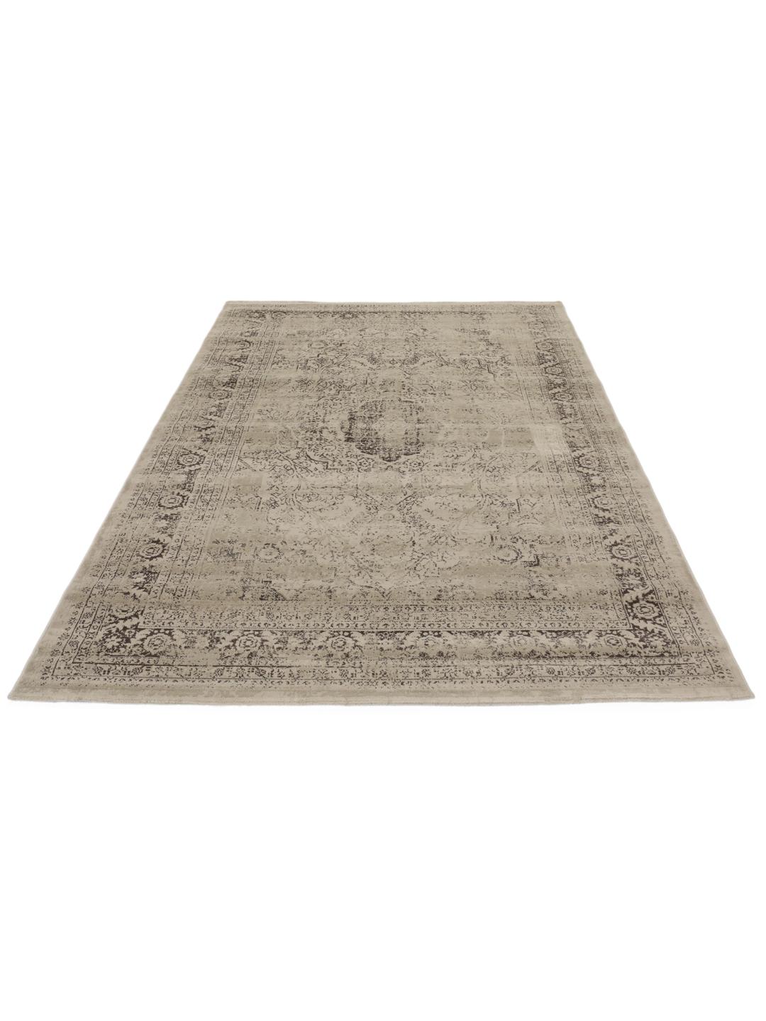 Beige vloerkleed met laagpolig oppervlak