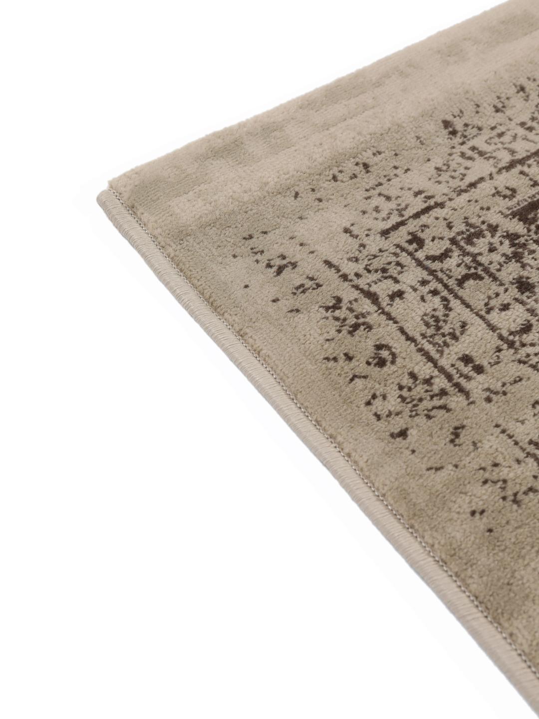 Beige vloerkleed met laagpolig oppervlak