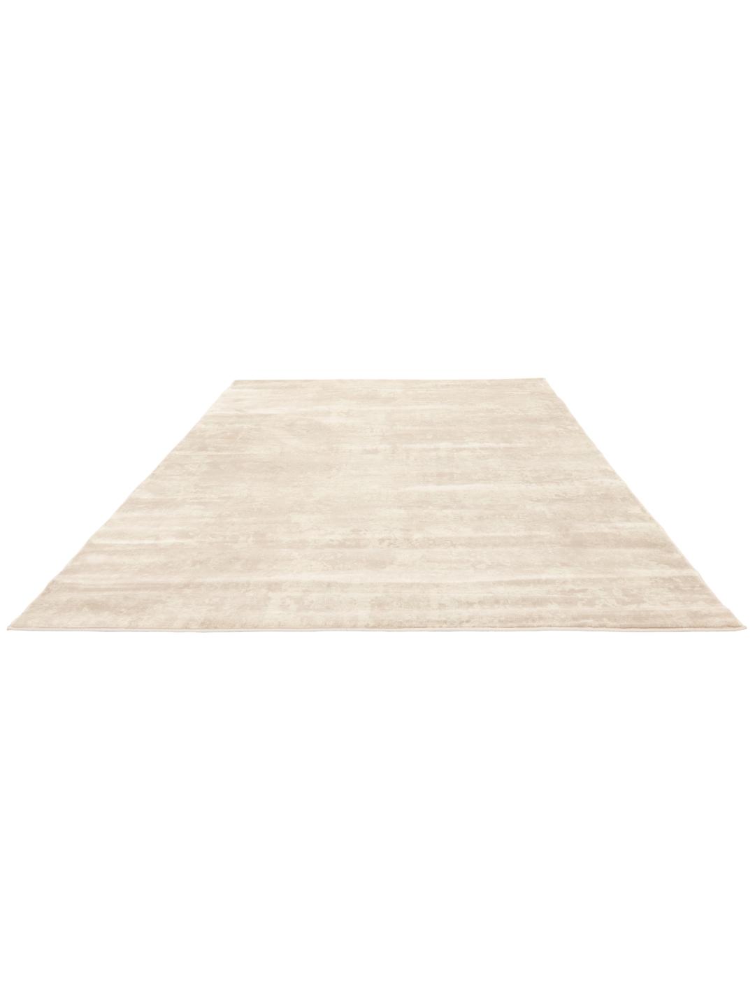 Tapis beige avec un motif subtilement vieilli
