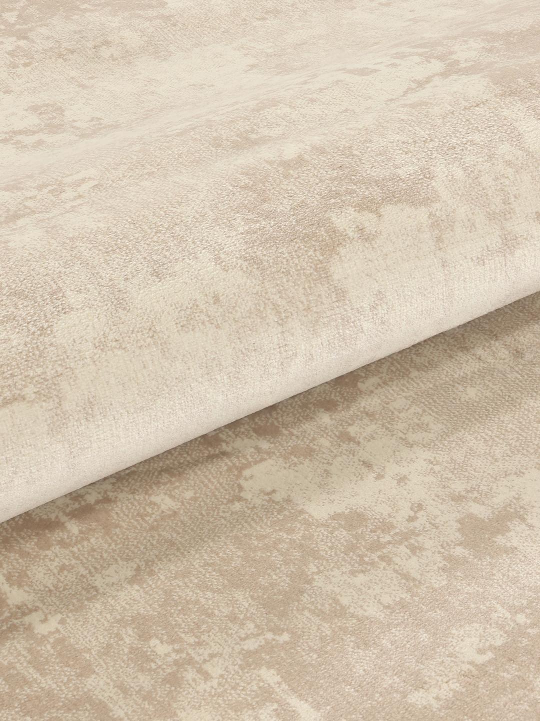 Rond beige tapijt met zachte textuur