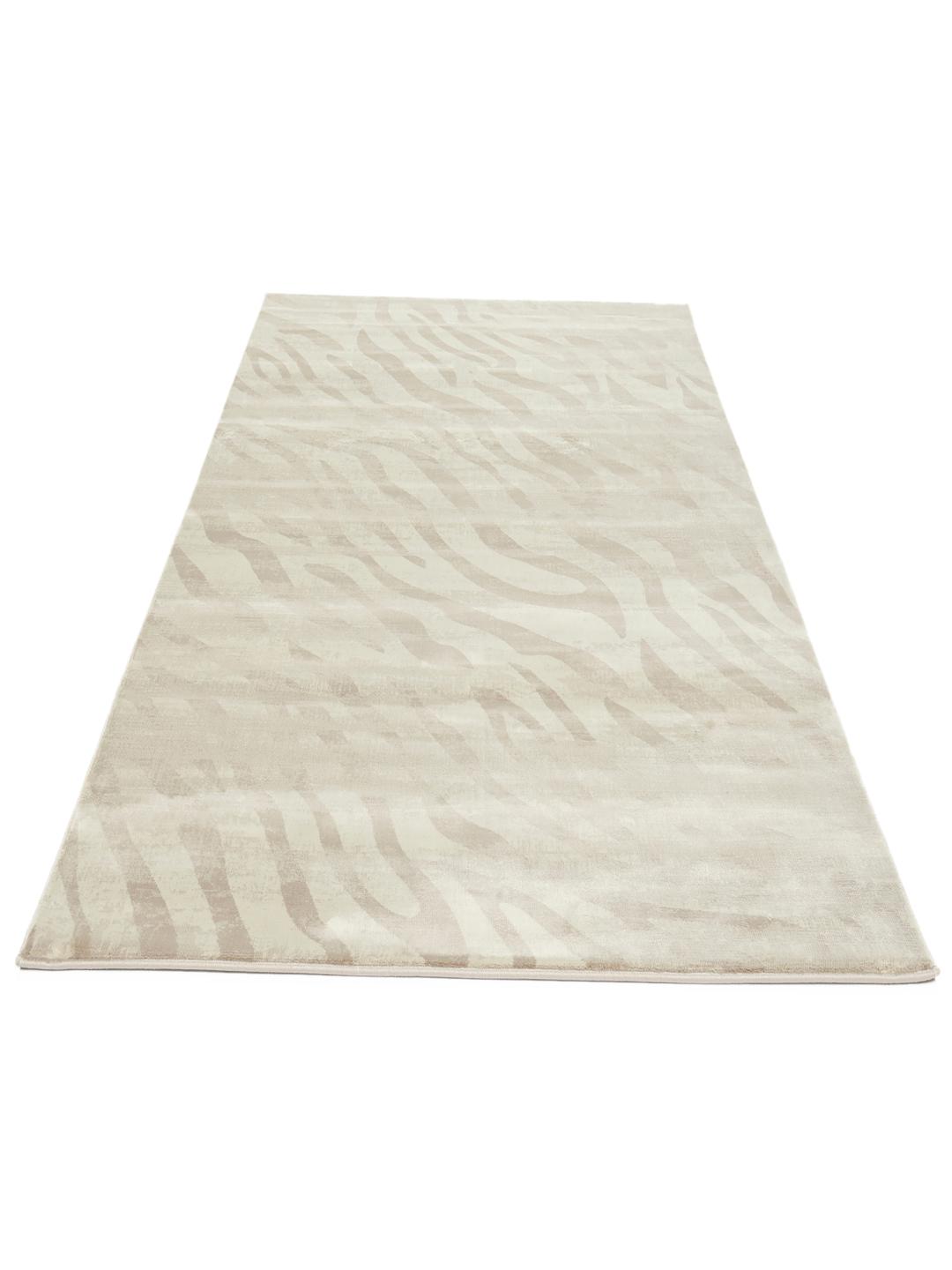Beige løber med et subtilt dyremønster