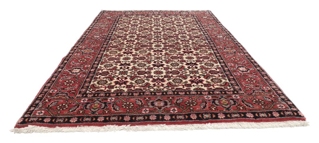 Handgeknoopt Bidjar-tapijt uit het Midden-Oosten in rood en beige met ingewikkelde bloempatronen.