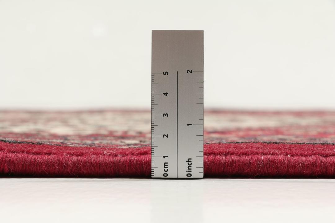 Håndknyttet Abadeh-tæppe med et rødt og blåt blomstermedallion-design fra Mellemøsten