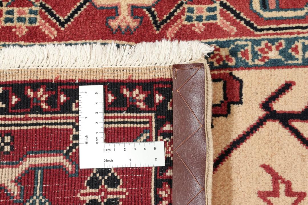 Handgeknoopt Heriz-tapijt uit het Midden-Oosten in rode en beige tinten