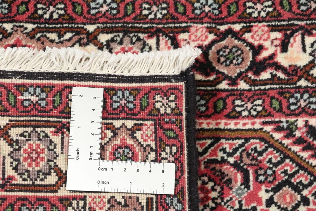 Met de hand geknoopt Bidjar-tapijt uit het Midden-Oosten met een medaillonontwerp in donkerrood en zwart