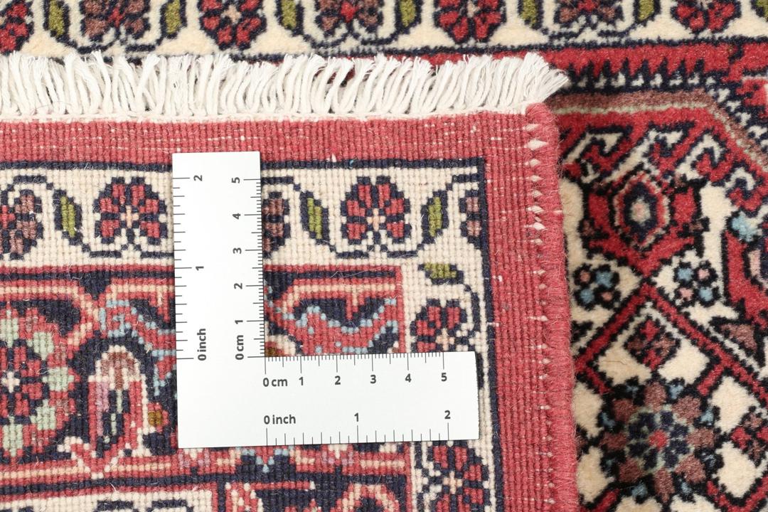 Håndknyttet Bidjar-tæppe fra Mellemøsten i røde nuancer