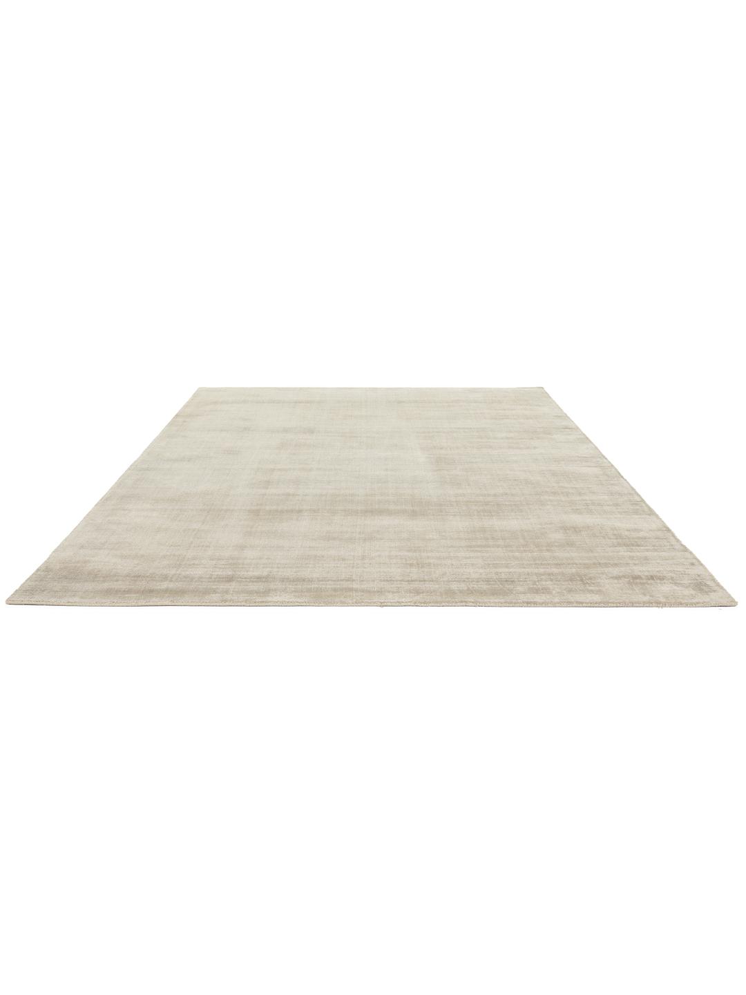 Beige tæppe med en blød luvtekstur