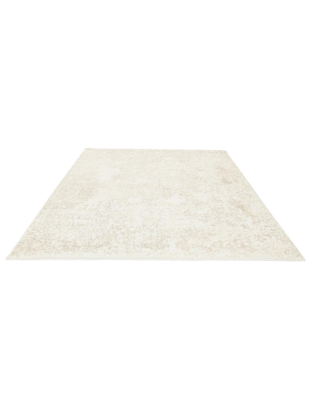 Beige tæppe med tekstur af høj og lav luv