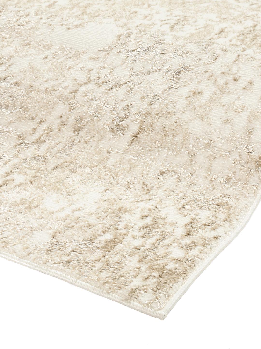 Beige tæppe med tekstur af høj og lav luv