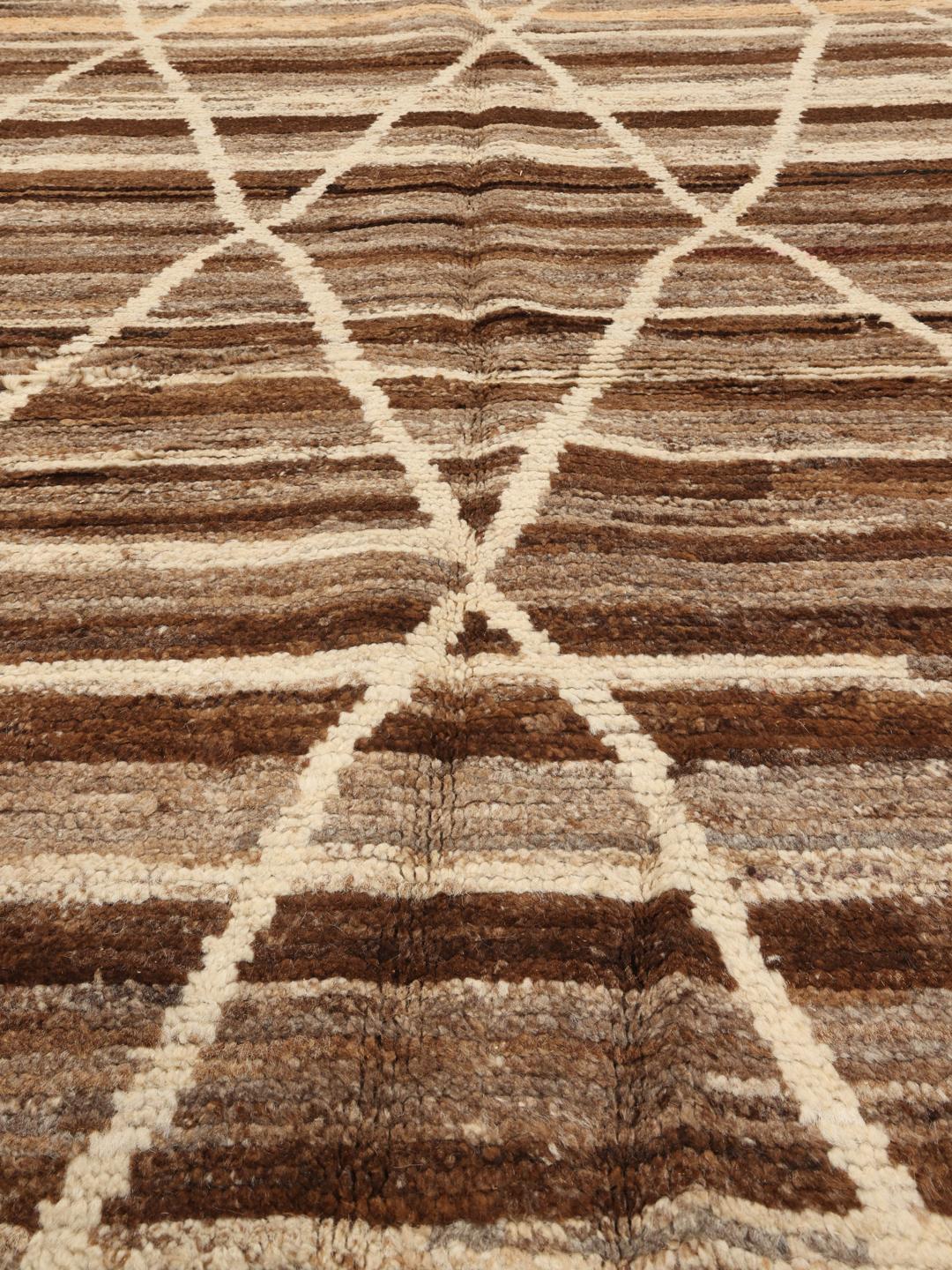 Handmade Berber style rug from Afghanistan in brown tones with geometric patterns
