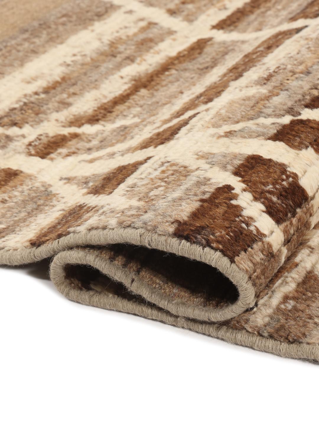 Handmade Berber style rug from Afghanistan in brown tones with geometric patterns