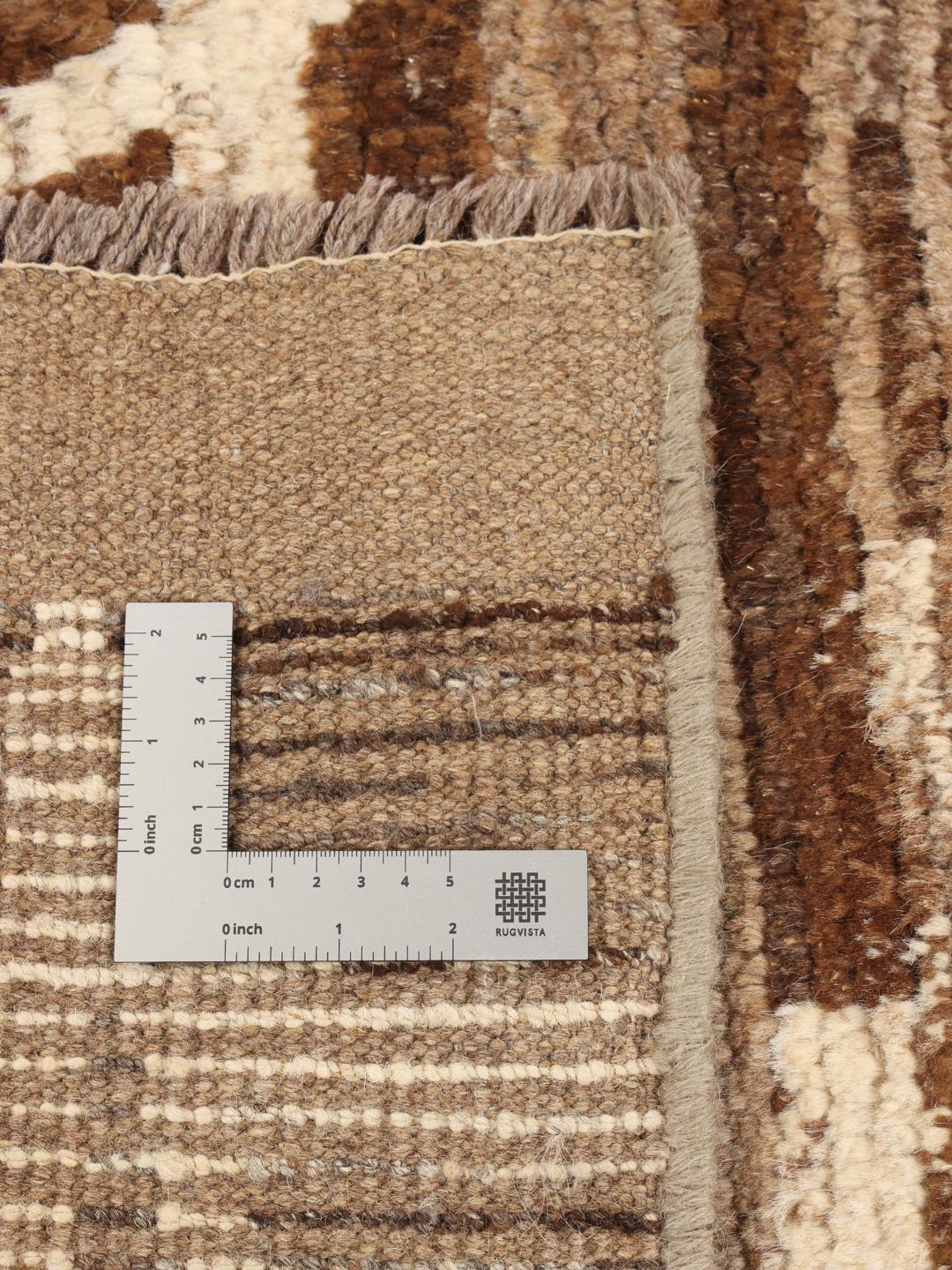 Handmade Berber style rug from Afghanistan in brown tones with geometric patterns