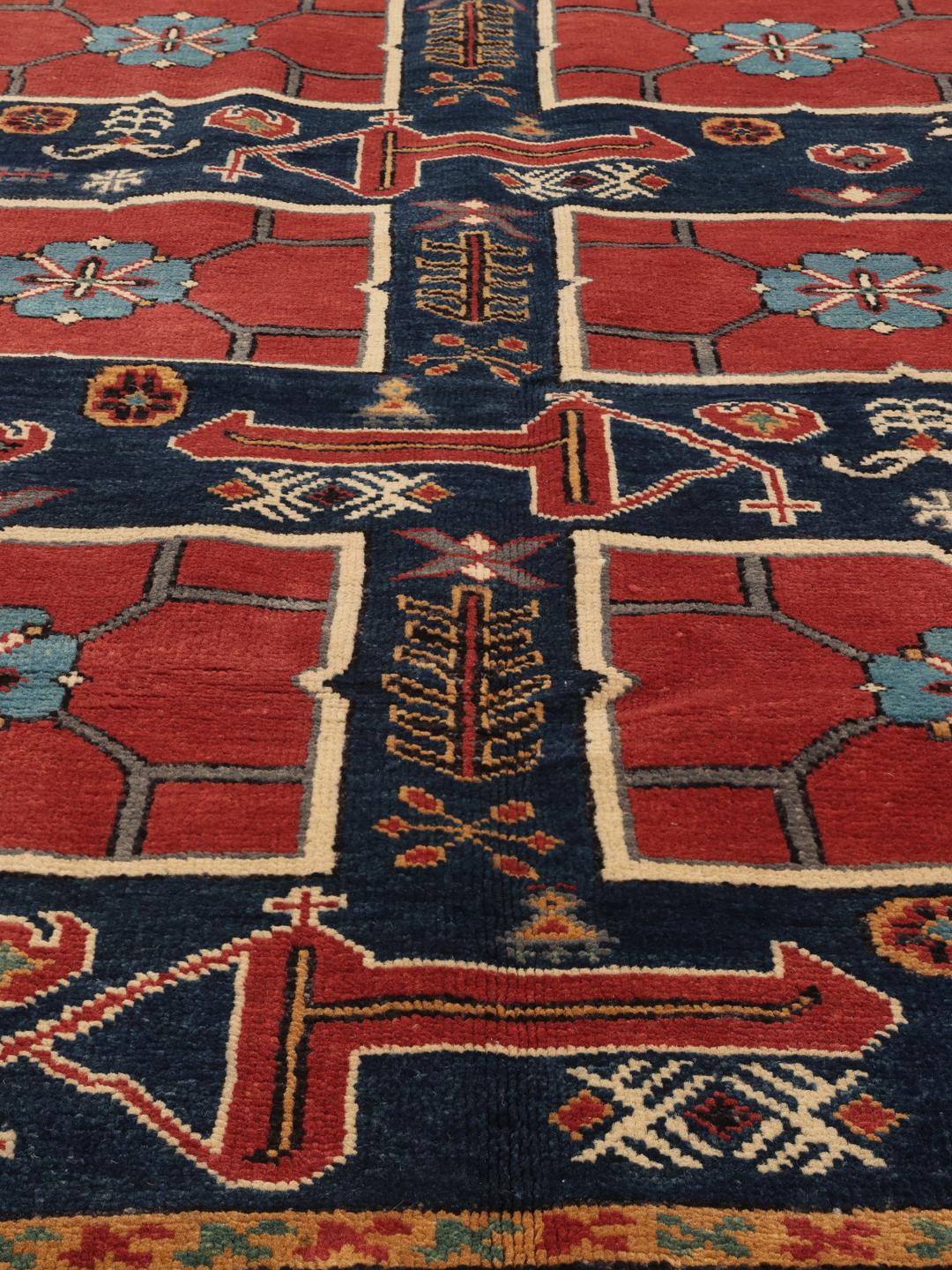 Tapis Kazak noué à la main originaire d'Afghanistan présentant un motif géométrique multicolore vibrant