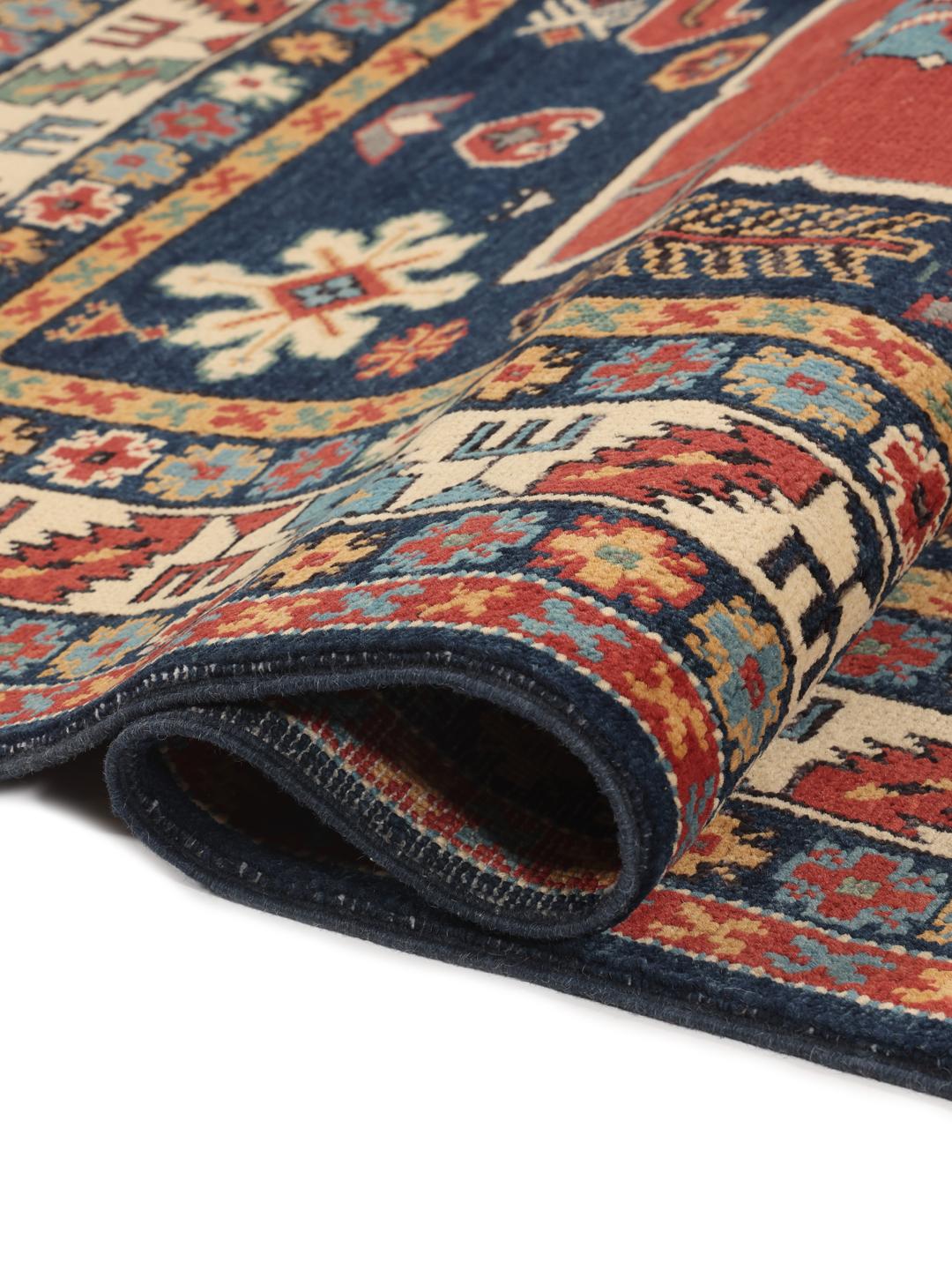 Tapis Kazak noué à la main originaire d'Afghanistan présentant un motif géométrique multicolore vibrant