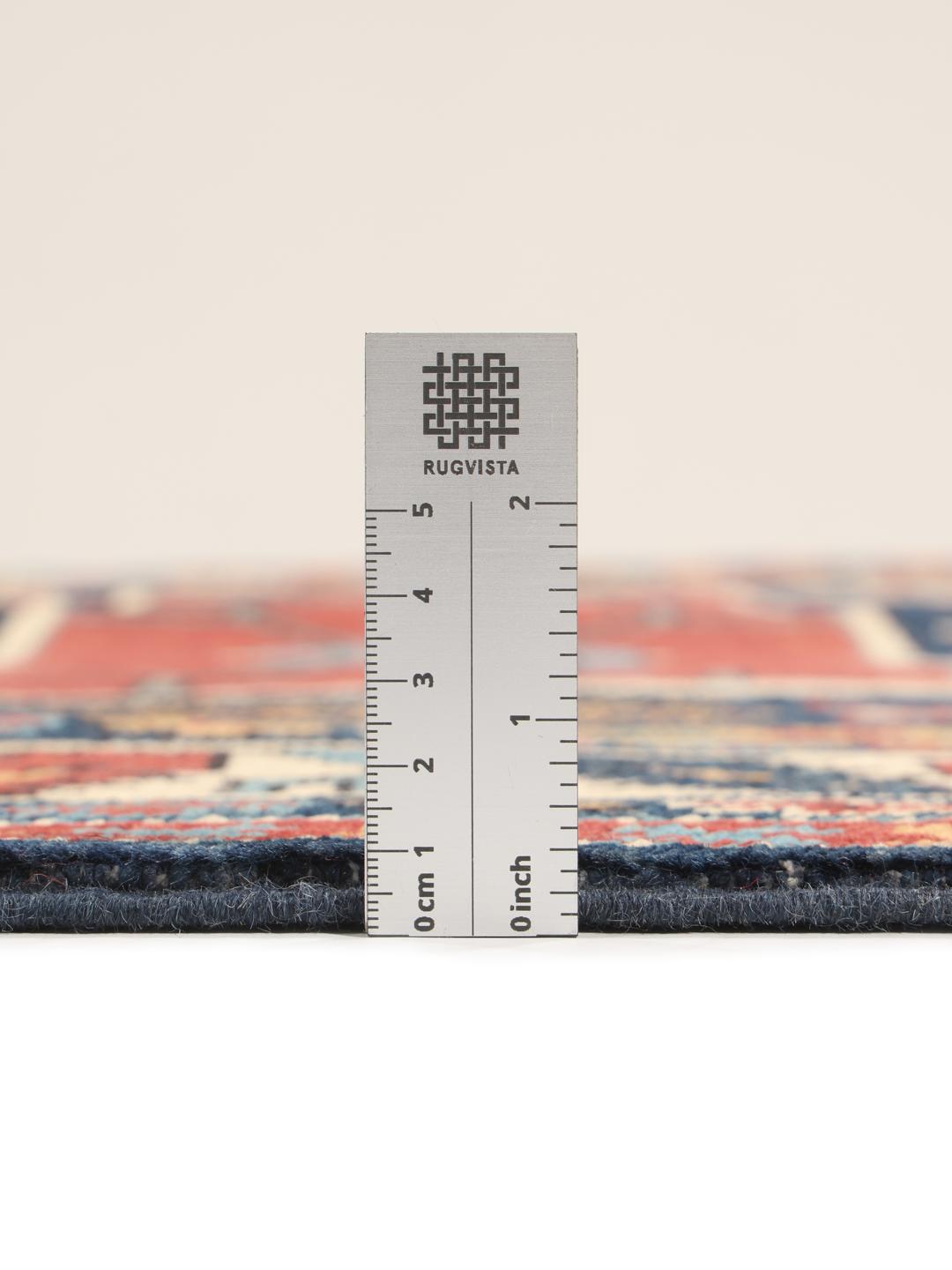 Tapis Kazak noué à la main originaire d'Afghanistan présentant un motif géométrique multicolore vibrant