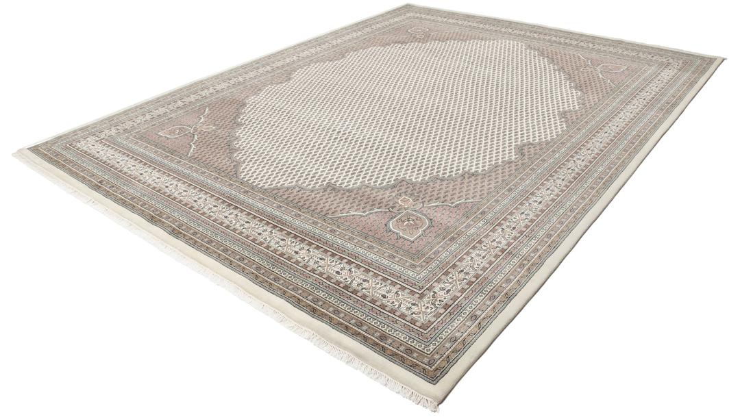 A large rectangular hand-knotted Sarouk Mir rug from India in shades of brown and beige.